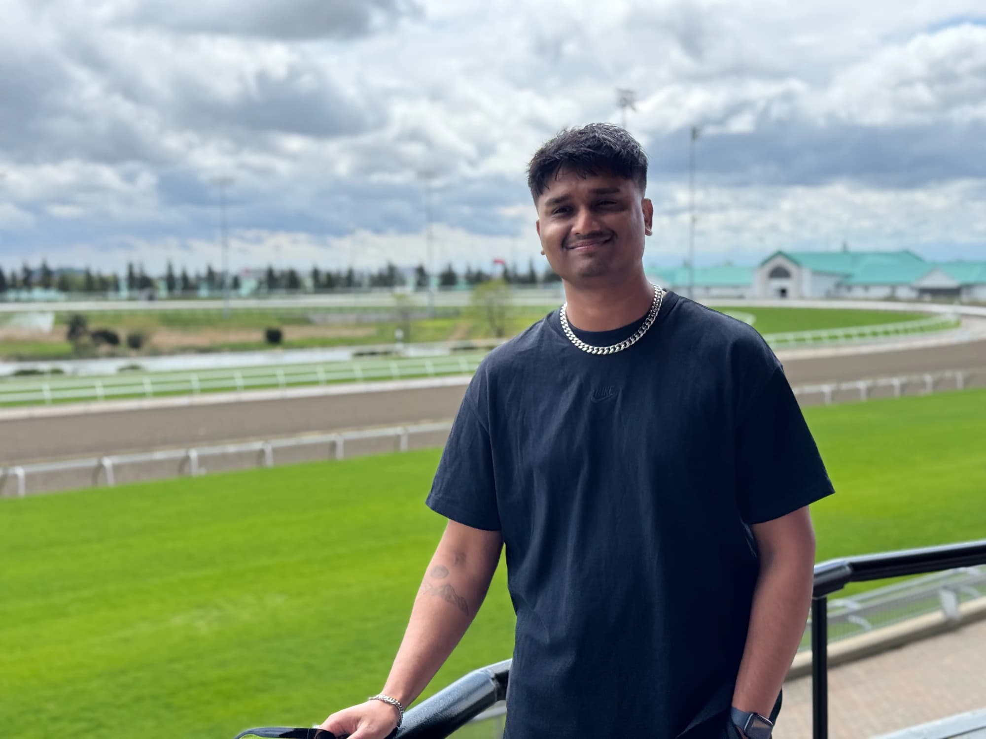Fahmid Uddin outdoors beside a railing